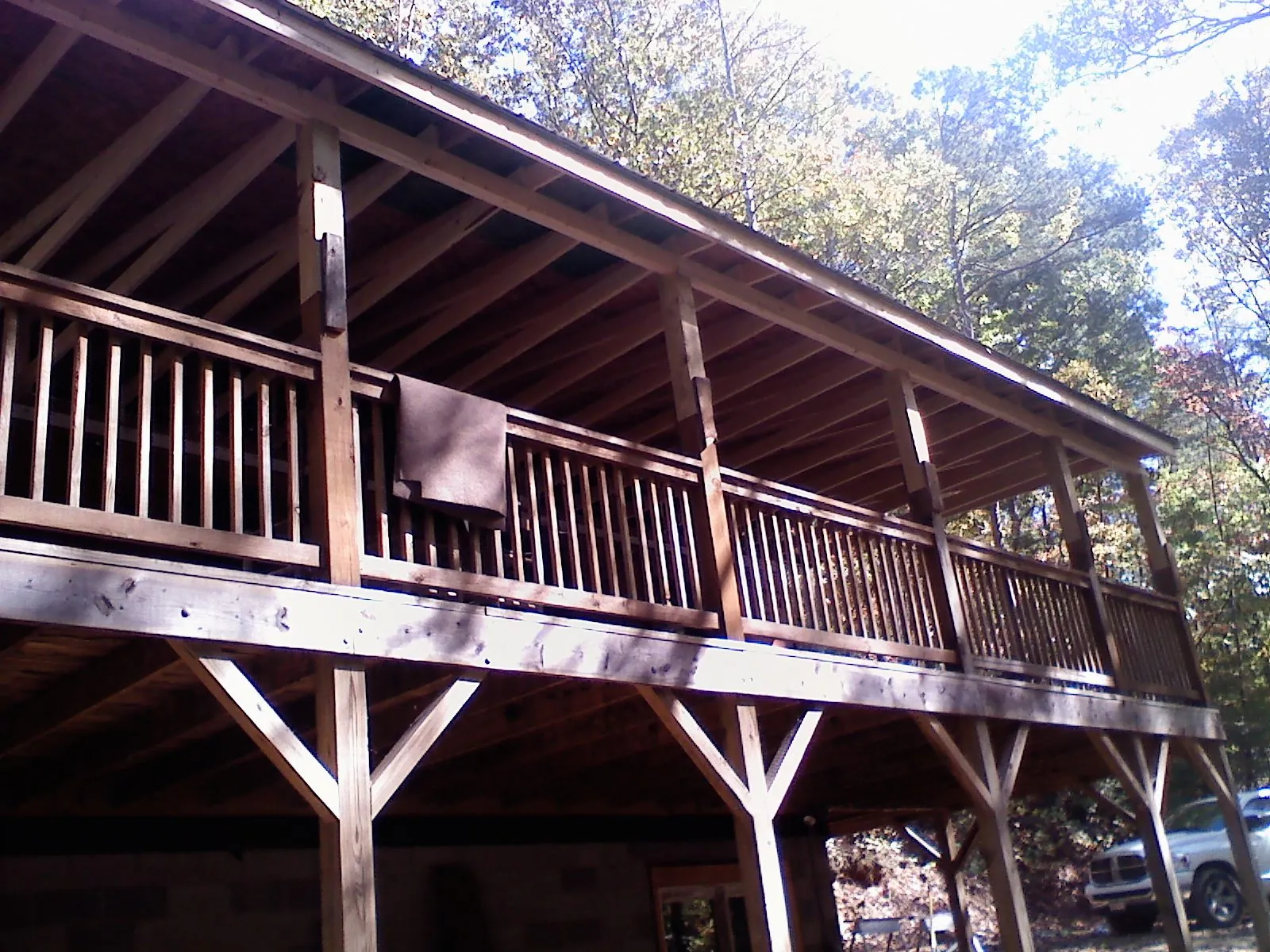 Timber framing under a new elevated porch and deck — Roof Leak Repair in Butte City by Roofing Brothers
